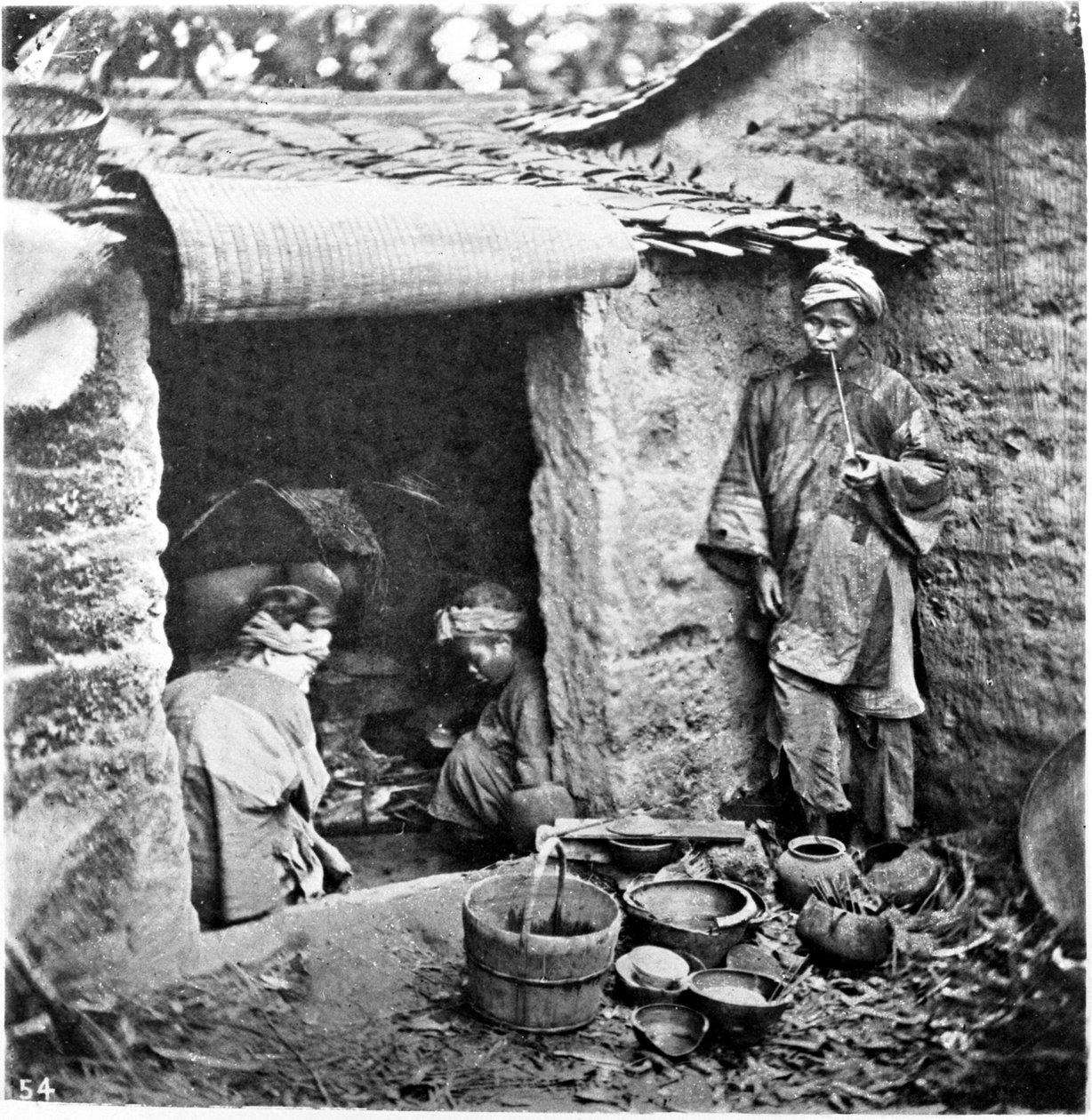 चीन, एक साधारण परिवार, c.1870 (फोटो) द्वारा जॉन थॉमसन