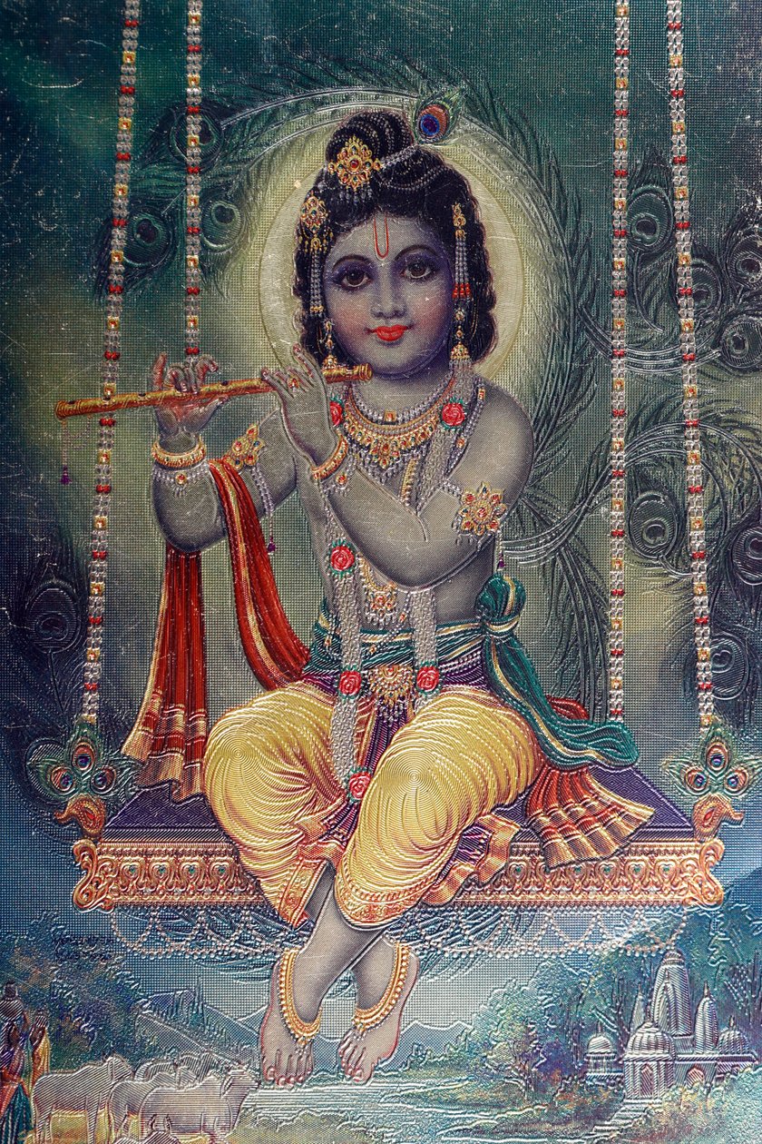 भगवान कृष्ण बांसुरी के साथ। हिंदुओं के देवता। द्वारा . .